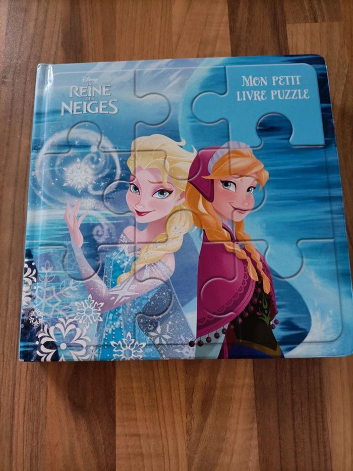 Livre avec puzzles Reine des neiges - photo numéro 1