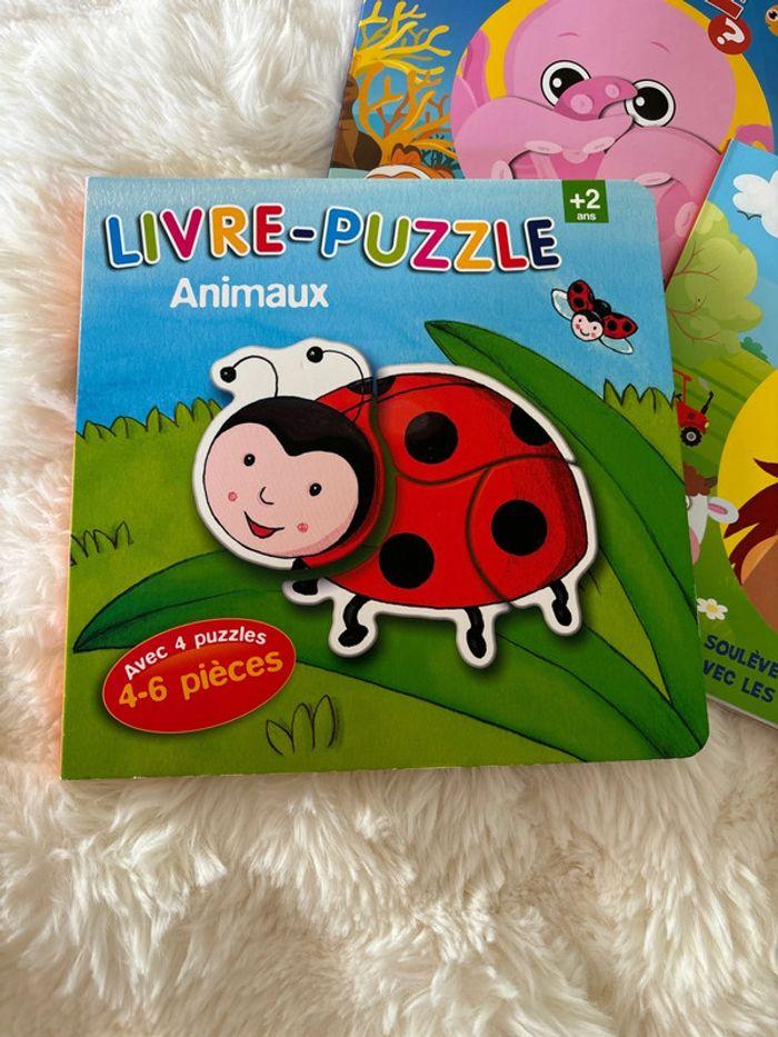 Lot livres puzzles et a soulever - photo numéro 2