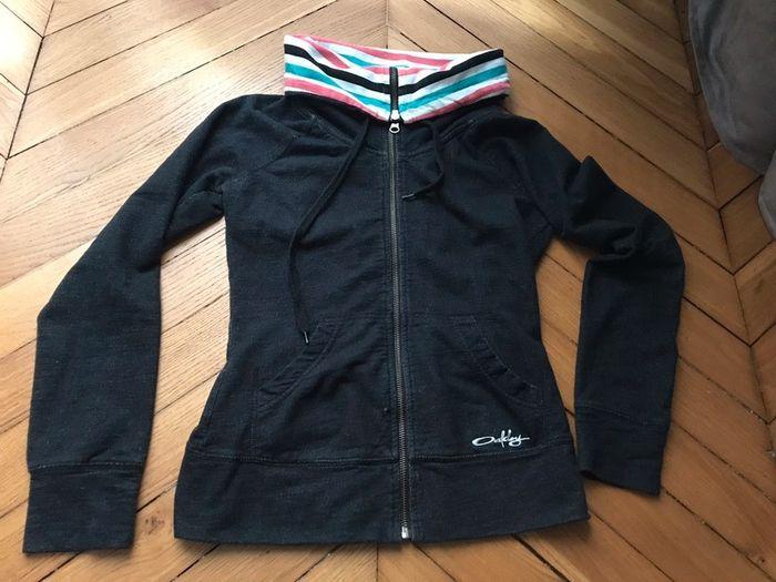 Veste zippee noire t.xs oakley très bon état - photo numéro 1