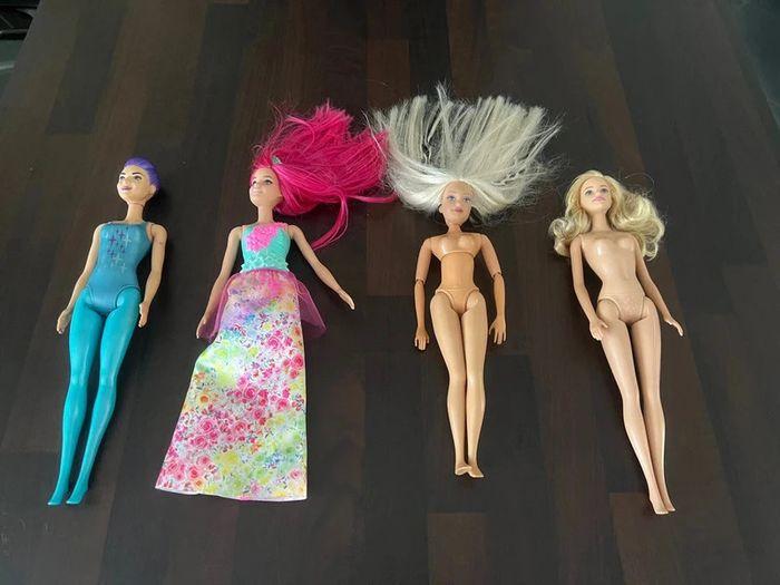 Lot de 4 barbie en parfait état - photo numéro 1