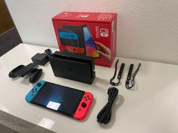 Nintendo Switch OLED Édition (Neuf ) avec jeux et accessoires - photo numéro 3