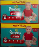 2 paquets de couches Pampers taille 4