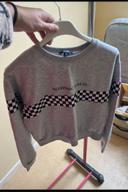 Pull dessin damier