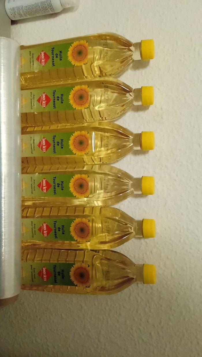 Bouteilles d'huiles de tournesol - photo numéro 3