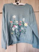 Pull bleu turquoise fleuri 6 - 8 ans h&m