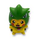 Pikachu en Tyranocif (Tyranitar)