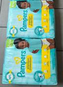 Lot de paquets de couches Pampers taille 6