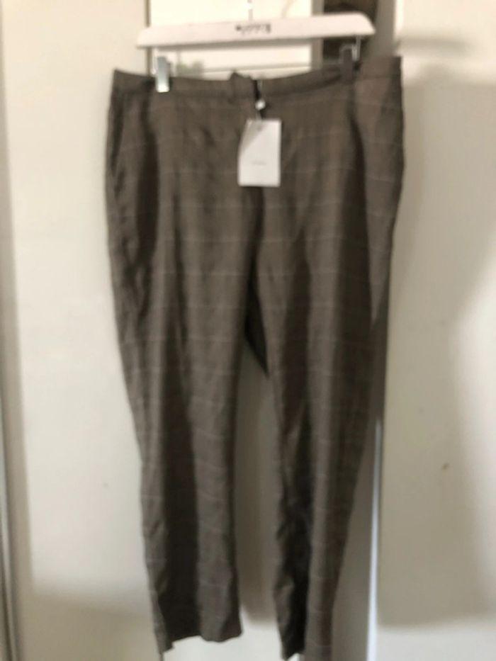 Pantalon tailleur léger . neuf . Taille 44 - photo numéro 1