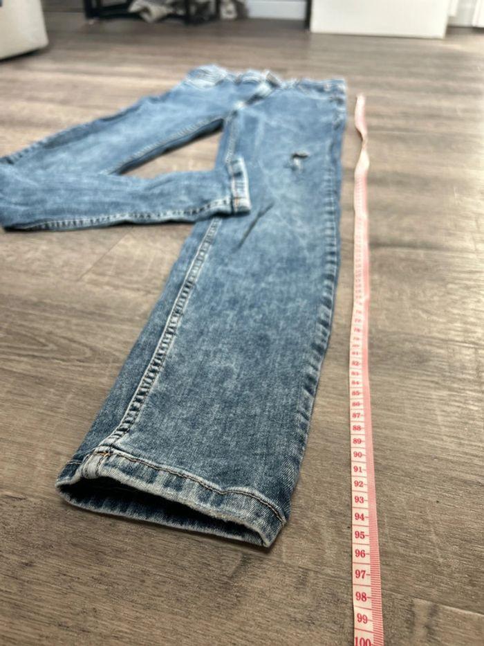 Jeans taille haute effet délavé troué - photo numéro 2