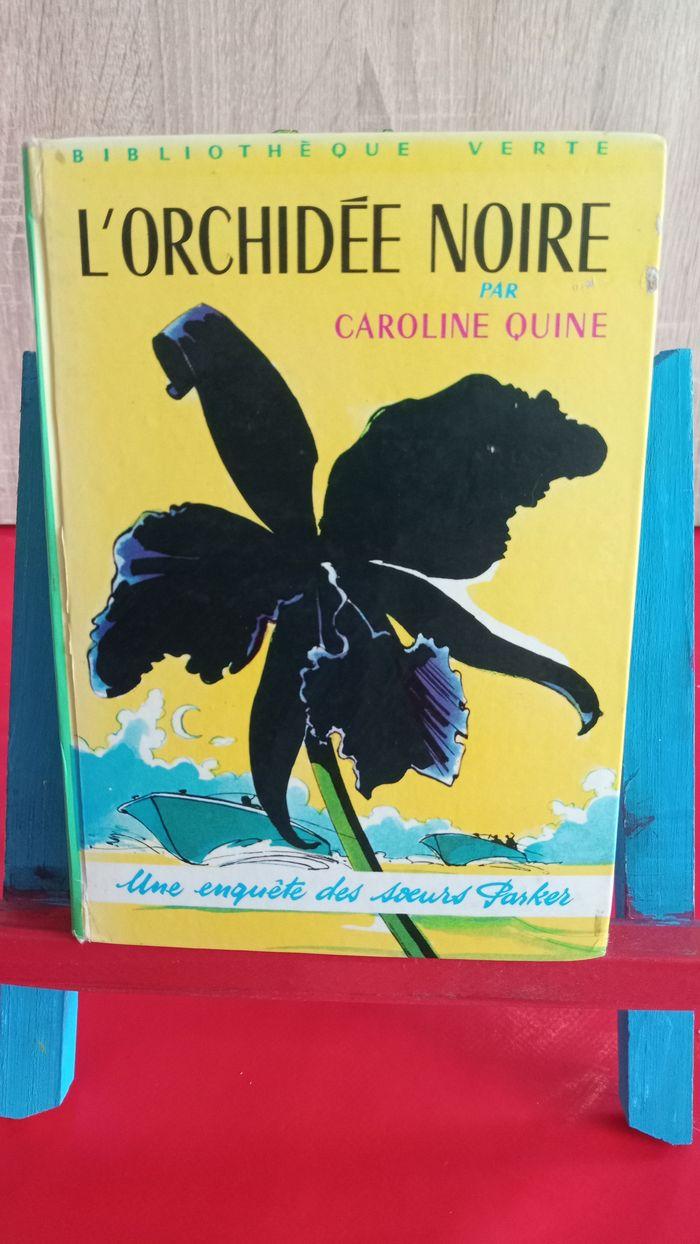 L'Orchidée noire, 1967, n° 330, une enquête des sœurs Parker bibliothèque rose, Caroline Quine - photo numéro 1