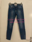 Jean bleu taille haute coupe mid rise skinny ankle neuf Calvin Klein Jeans taille W24 soit taille 34