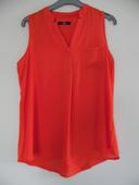 Jolie blouse rouge/orange, taille 40.