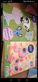 2 livres petshop neuf