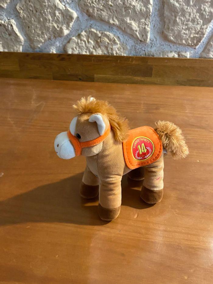 Petite peluche cheval qui fait du bruit - photo numéro 3