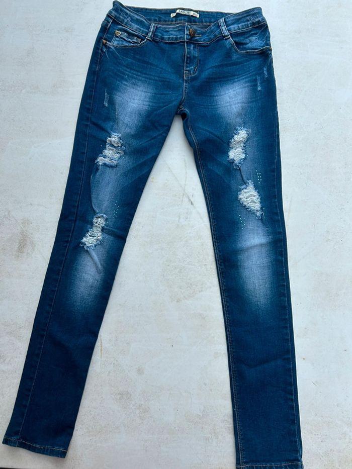 Jean skinny taille basse bleu à trous - photo numéro 2