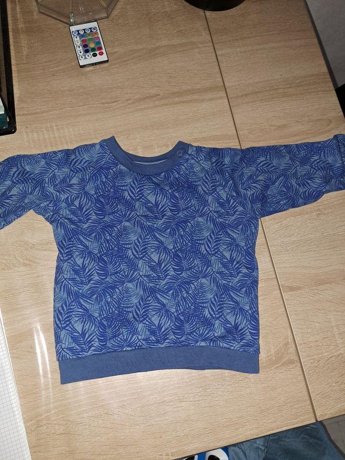 Sweat bleu avec palmier leger