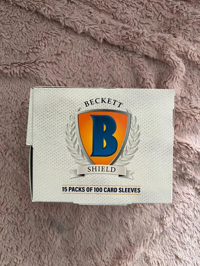 15 packs of 100 cards sleeves by Beckett Shield - photo numéro 1