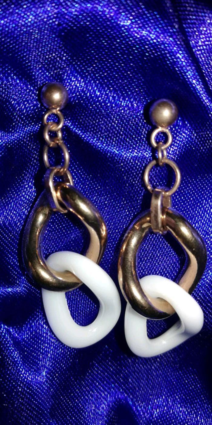 Boucles d'oreilles en acier - photo numéro 5