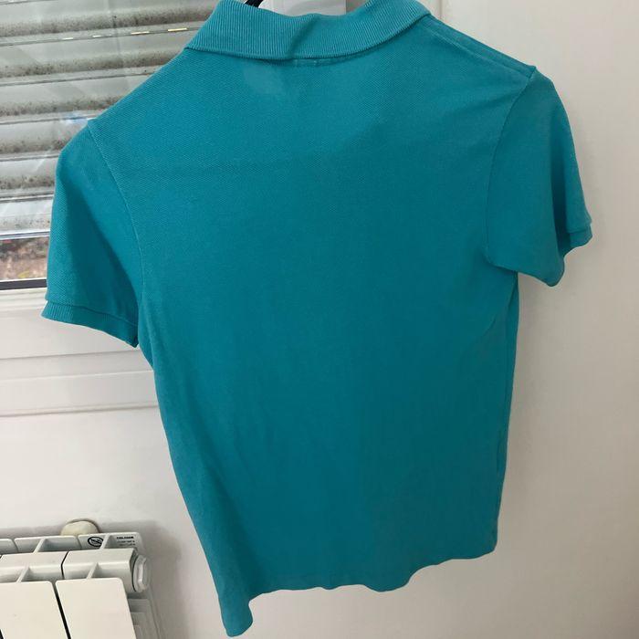 Polo Lacoste bleu turquoise, taille 10 ans en très bon état - photo numéro 3