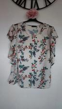 Blouse transparente a fleurs taille xl