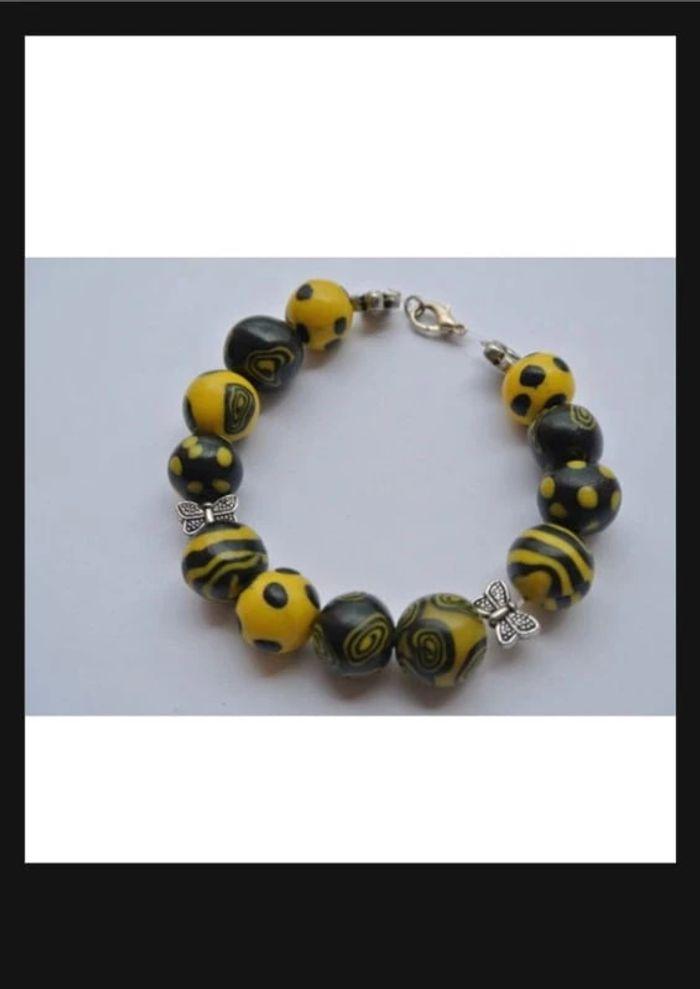 Bracelet jaune et noir - photo numéro 1