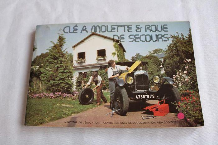 Livre "clé à molette et roue de secours" - photo numéro 1