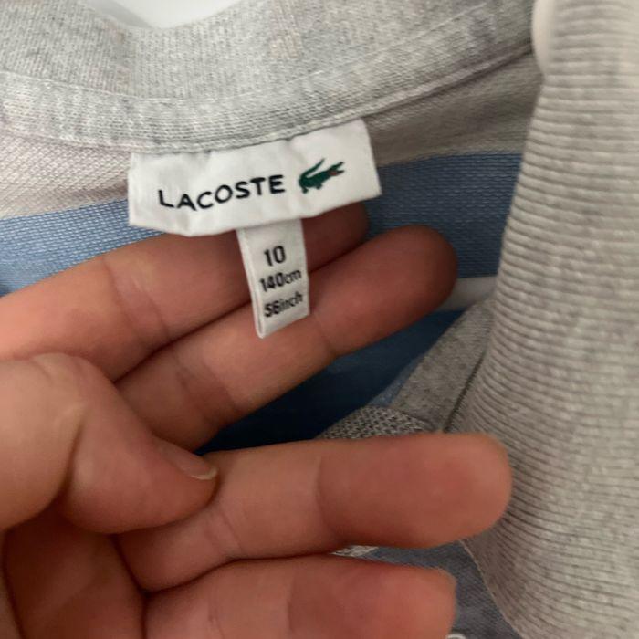 Polo Lacoste rayer gris, et bleu ciel taille 10 ans, en parfait état - photo numéro 4