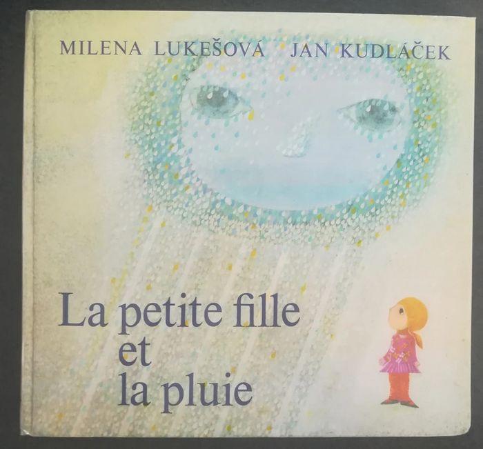 Livre La petite fille et la pluie - photo numéro 1