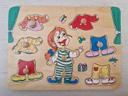 Puzzle en bois "s'habiller"