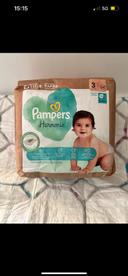 Paquet neuf couches Pampers T3