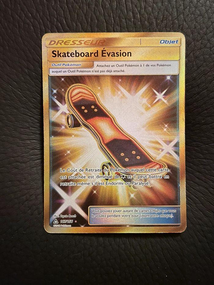 Carte Pokémon Skateboard Évasion Gold Ultra Prisme 167/156 - photo numéro 1