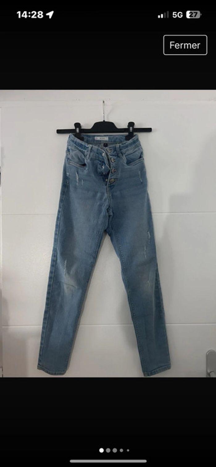 Lot pantalon jeans - photo numéro 1