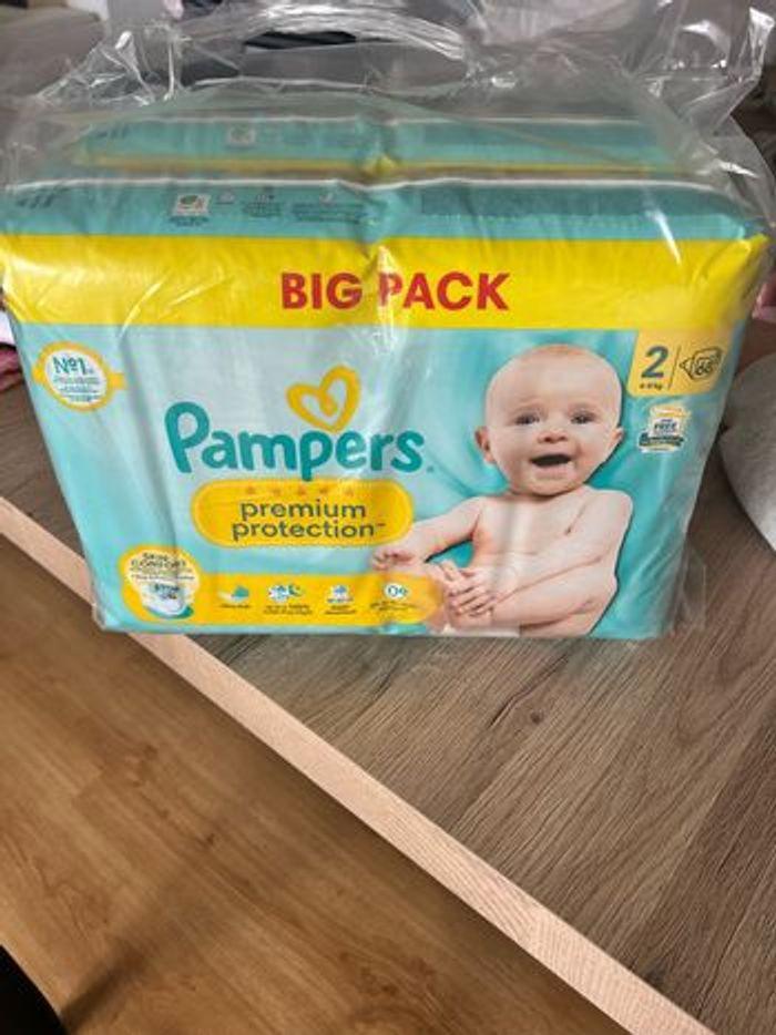 Pampers taille 2 (2X 68 langes + demi paquet)