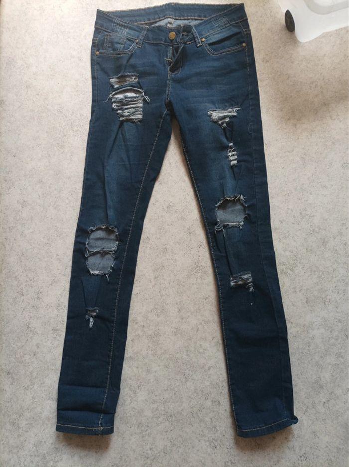 Jeans femme troué