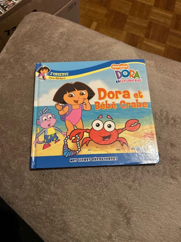 Livre dora bébé plage - photo numéro 1