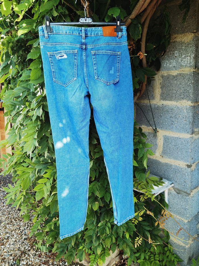 A1020 - jeans avec trous taille 36 - photo numéro 2