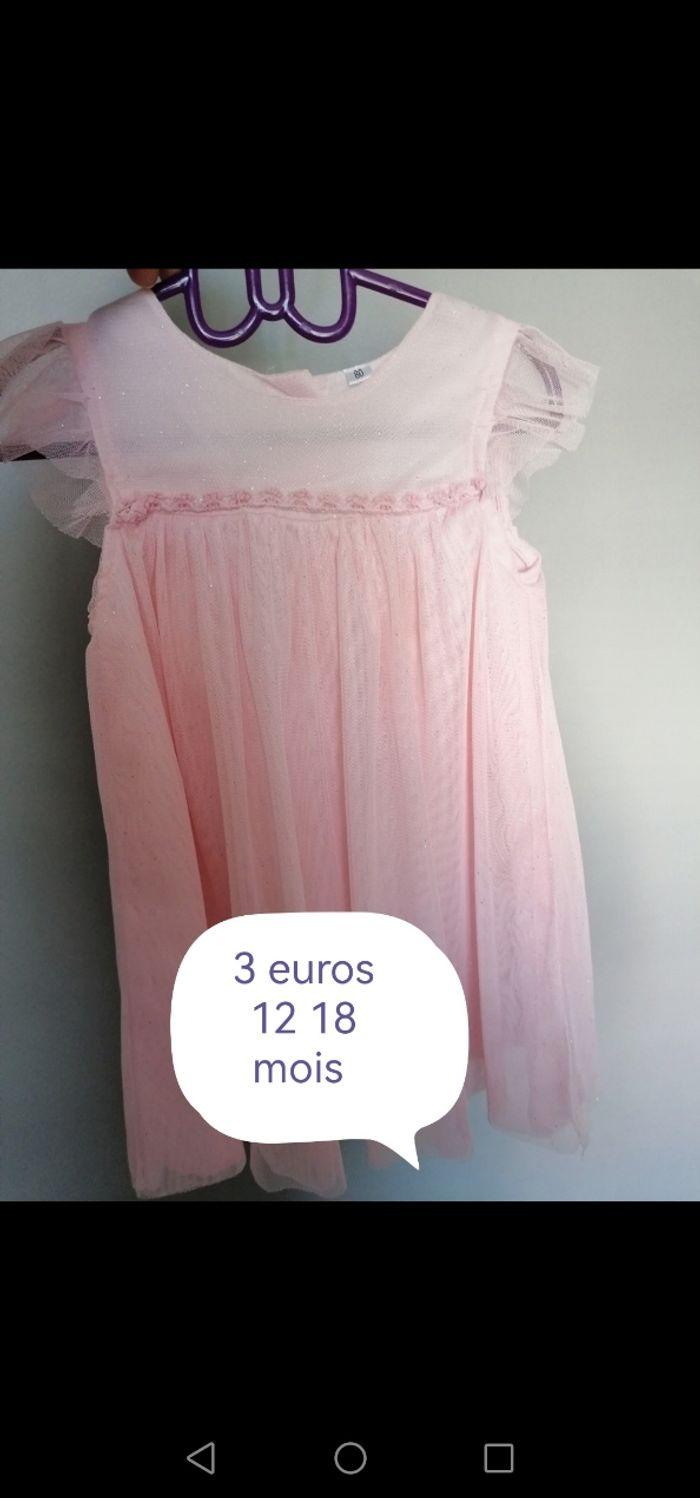 Très jolie robe.