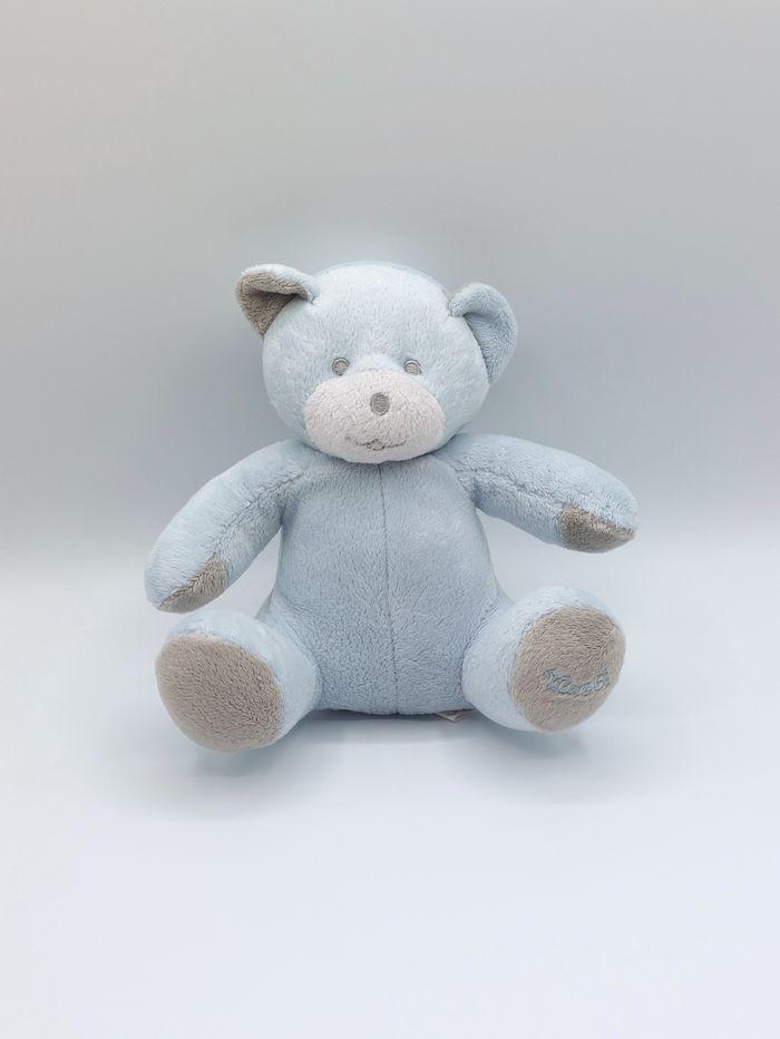 Doudou peluche ours bleu ciel gris Musti MUSTELA blanc 18 cm assis - photo numéro 1