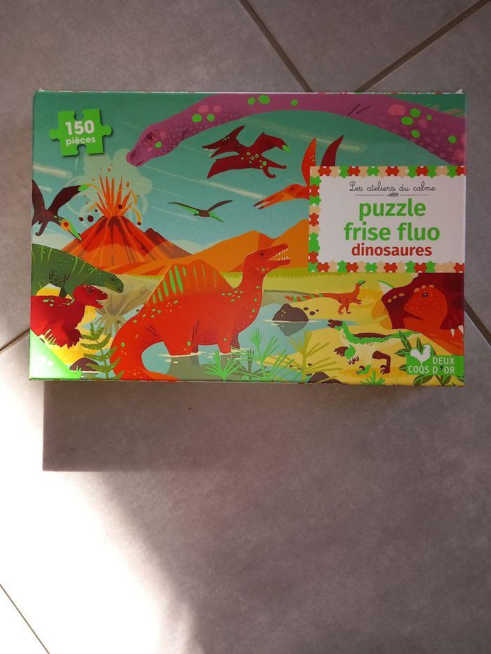 Puzzle 150 pièces frise fluo dinosaure neuf - photo numéro 1