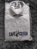 Chemise café coton 38 slim, sous plastique.