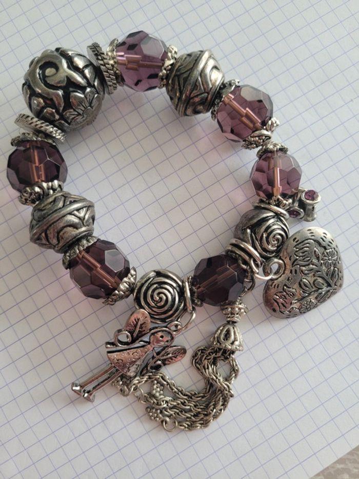 Bracelet mauve breloques - photo numéro 1