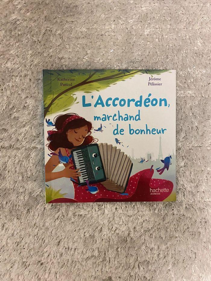 Livre - l’accordéon marchand de bonheur - photo numéro 1