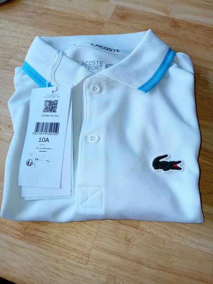 Véritable polo lacoste neuf avec etiquette - photo numéro 2