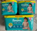 3 paquets de couches Pampers taille 4