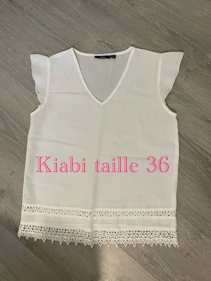 Blouse à manches courtes volant blanc dentelle en bas kiabi taille 36 - photo numéro 1