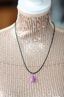 Collier pendentif cordon noir tortue violette neuve