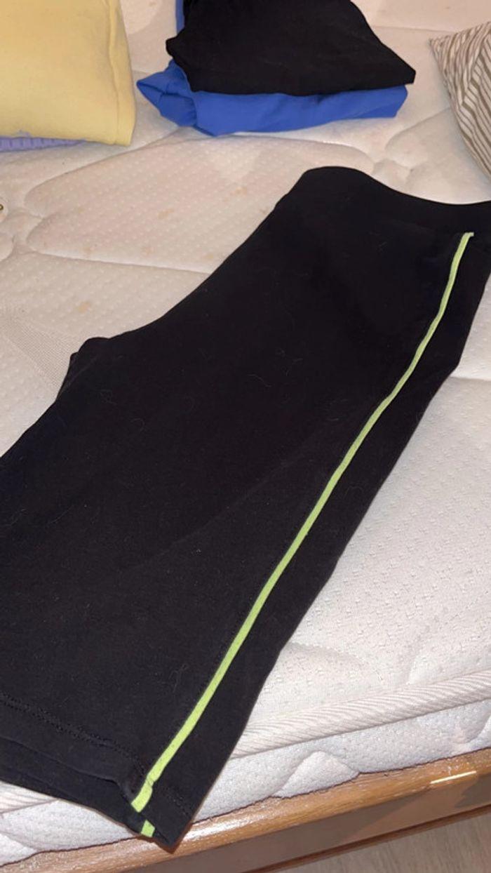 Pantalon cycliste de sport femme noir avec bandelette jaune - photo numéro 1