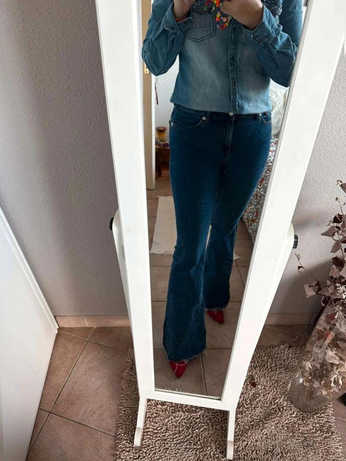 Chemise en jean  détail  sur  poche  avant taille  s/m - photo numéro 8