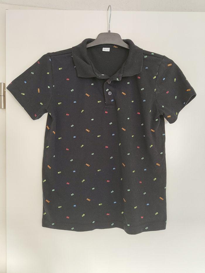 Polo noir écritures colorées Zeeman 12ans - photo numéro 1