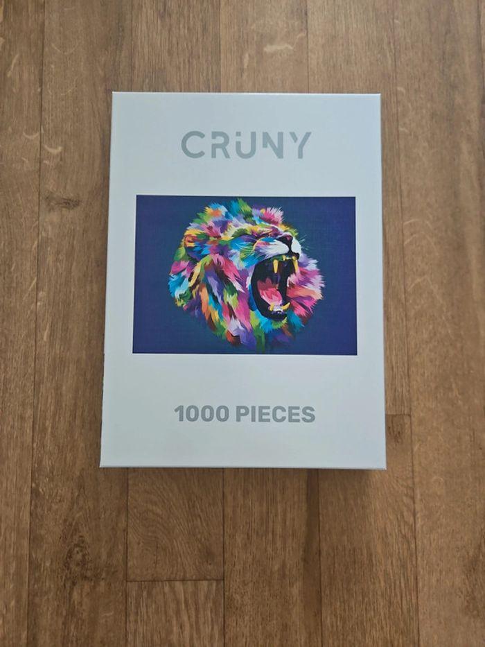 Puzzle lion 1000 pieces de CRUNY état neuf - photo numéro 1